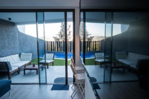 Casa Aire de Mar, modern house with private pool, overlooking Baviera golf, within walking distance of beach